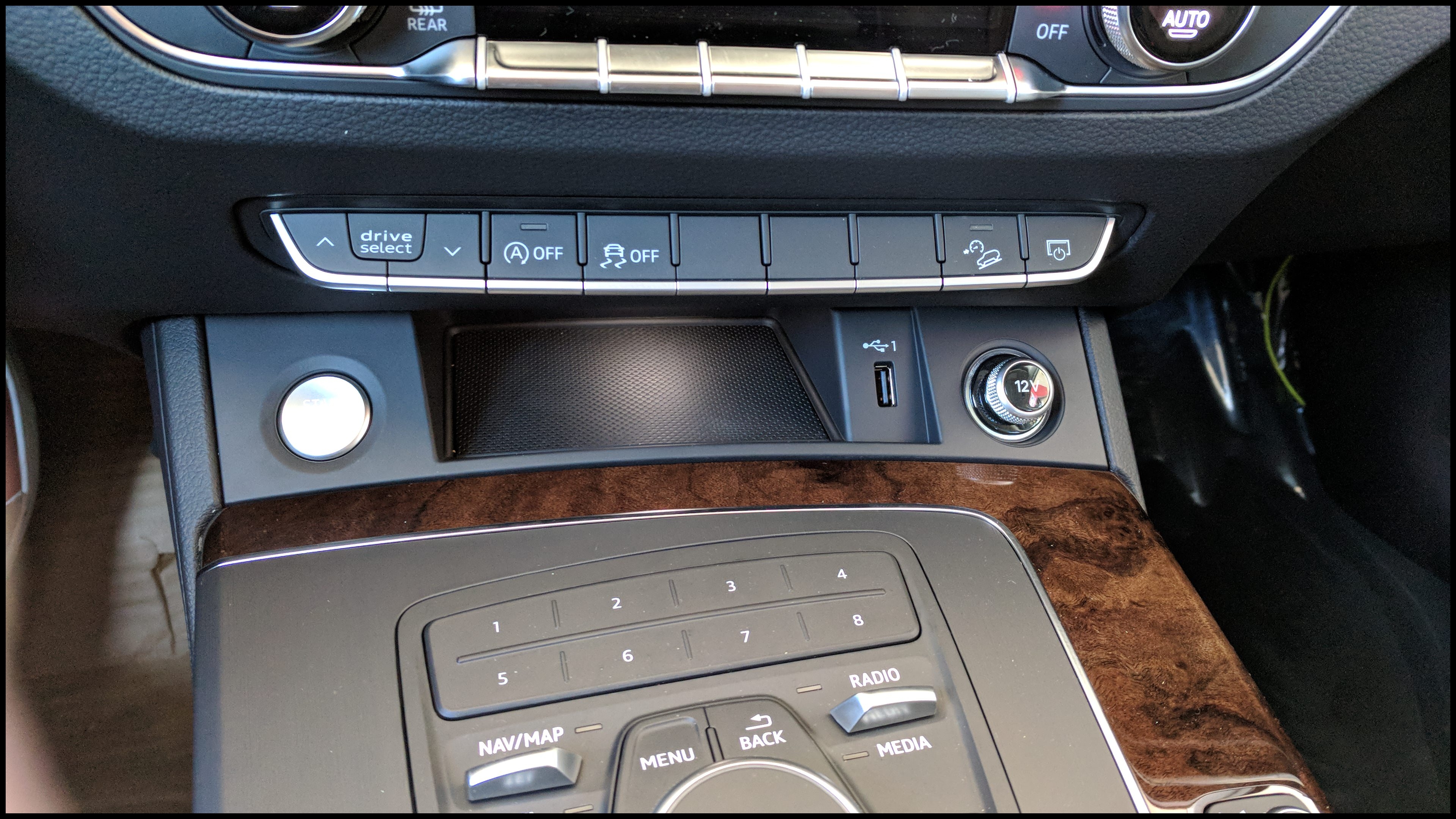 Like the A4 A5 the Q5 now has 1 USB port relocated to the front of the dash However I have no idea where they expect you to keep your phone when using